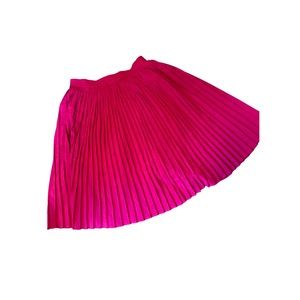 A New Day, pink pleated skirt